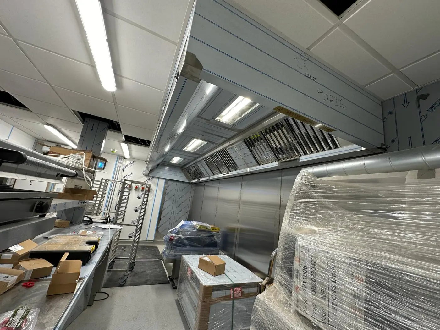 Stainless steel canopy with baffle filters and integrated lighting in the hotel kitchen at Offshore, Lytham St Annes, ahead of handover